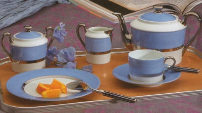 Tentation in azur by J seignolles, fine Limoges dinnerware